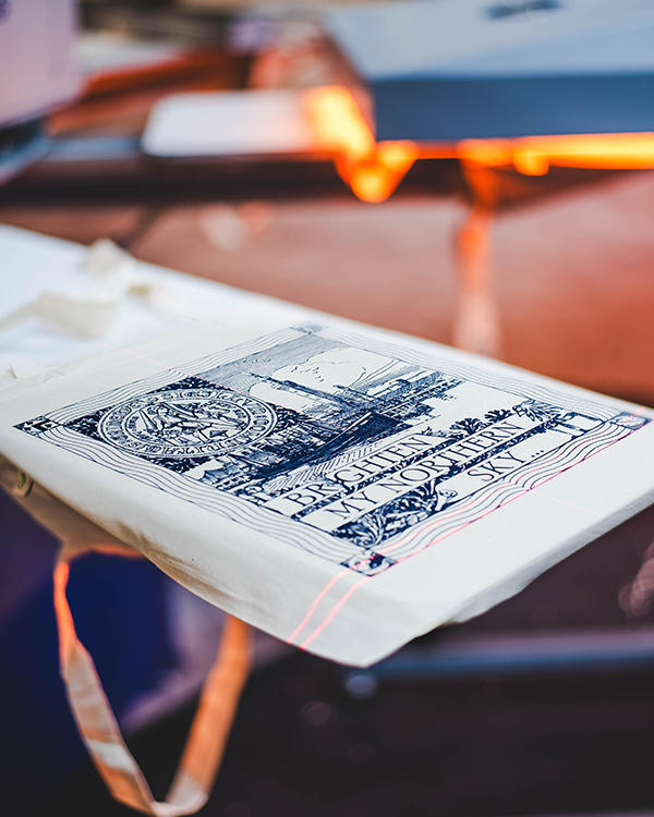 Screen printing tote bags in the UK with detailed artwork on premium cotton bags